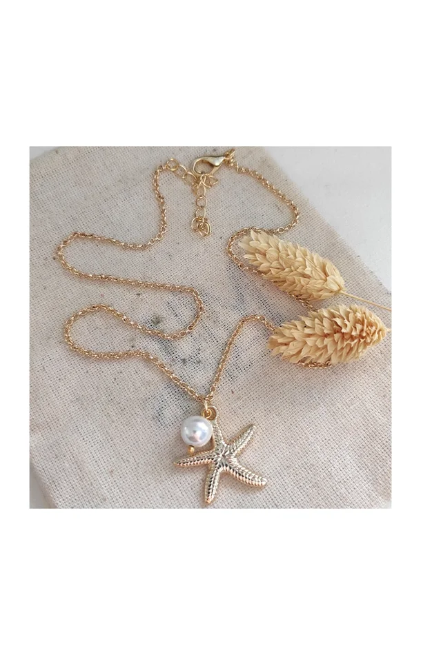 Collier pendentif en étoile de mer – Laiton doré, plaqué or & perle